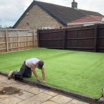 Installing fake grass in a garden in tipperary